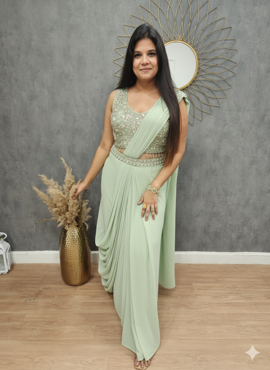 Shanaya light green drape saree