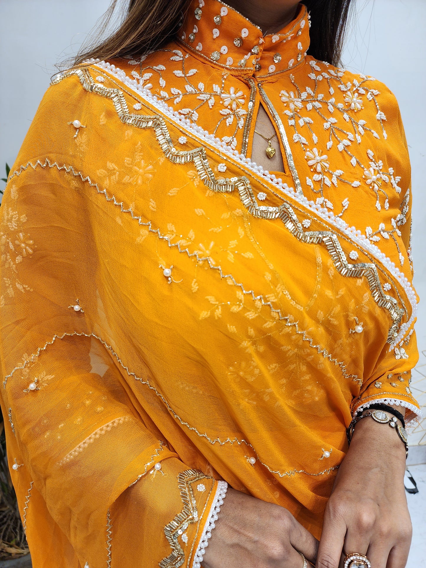 MADHURI ORANGE DRAPE EMBROIDED SAREE