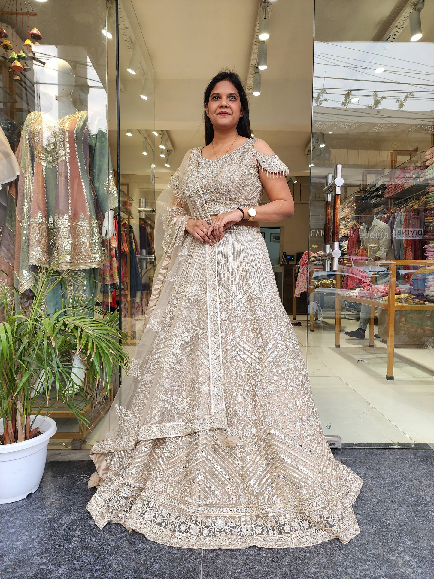 CHAMPAGNE AARIWORK LEHENGA WITH REAL MIRROR DETAILING