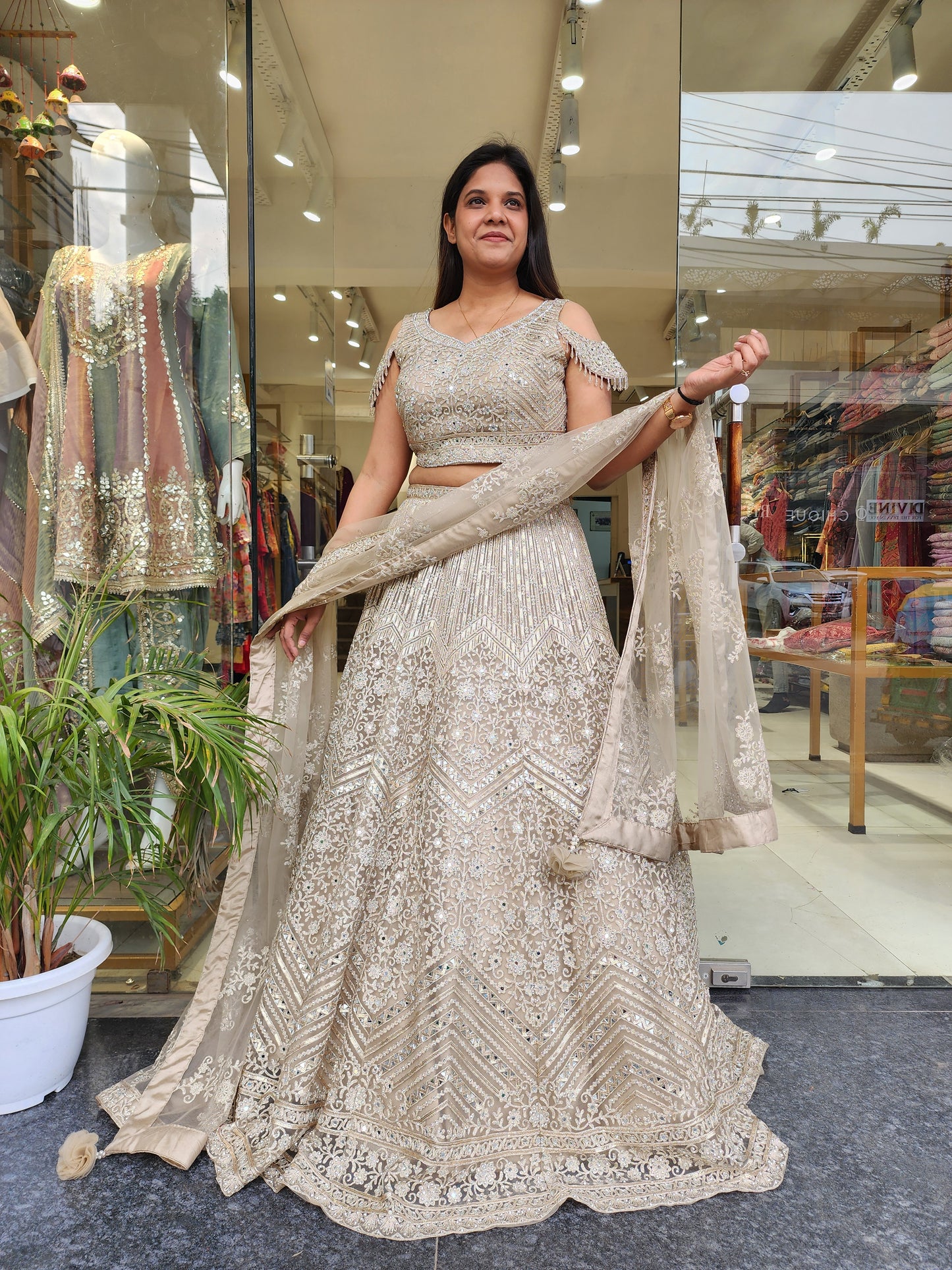 CHAMPAGNE AARIWORK LEHENGA WITH REAL MIRROR DETAILING