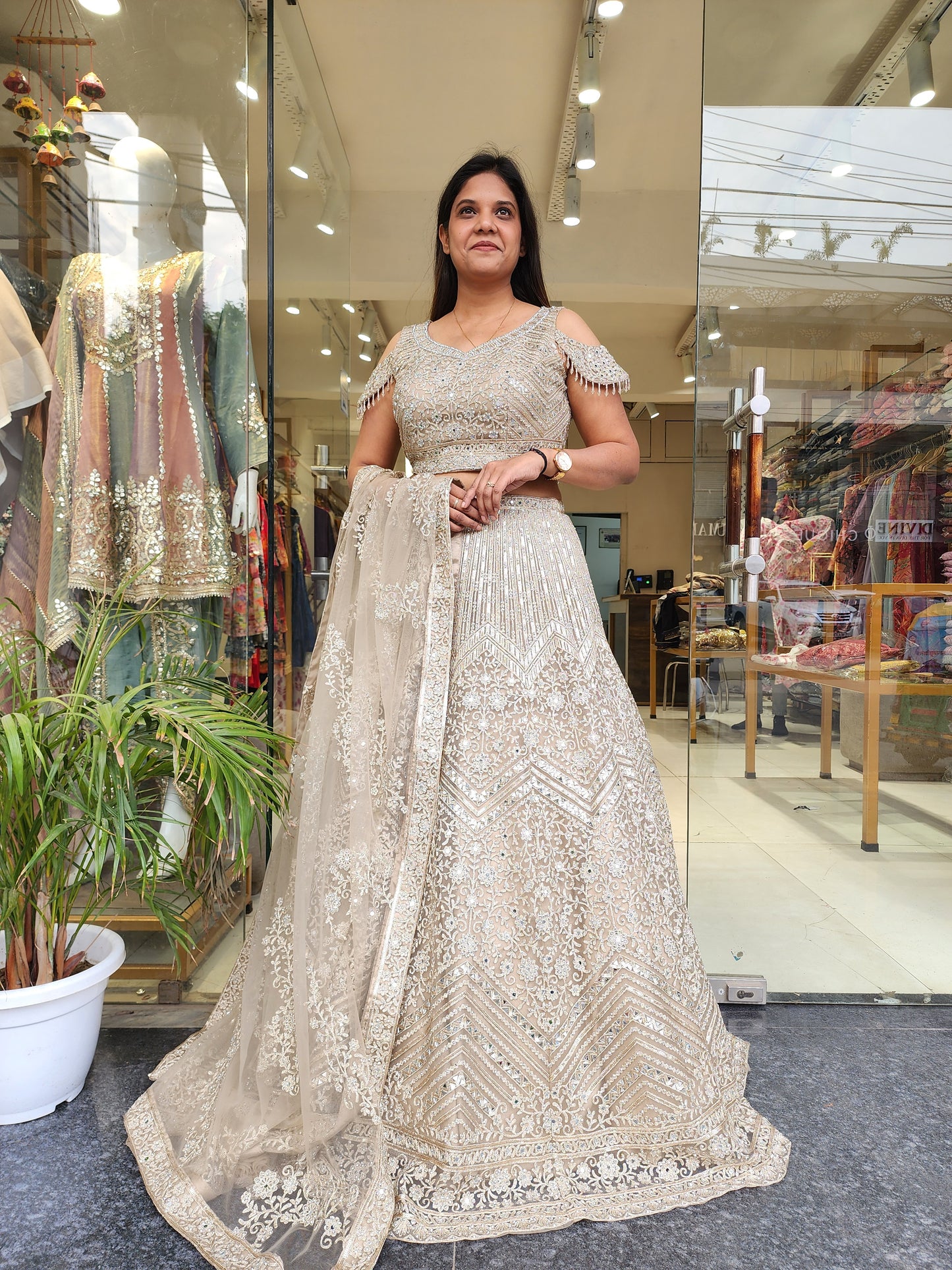 CHAMPAGNE AARIWORK LEHENGA WITH REAL MIRROR DETAILING