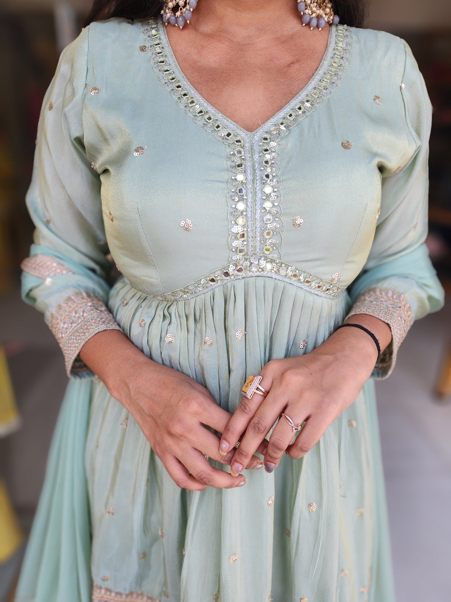 Reet mint green peplum garara suit