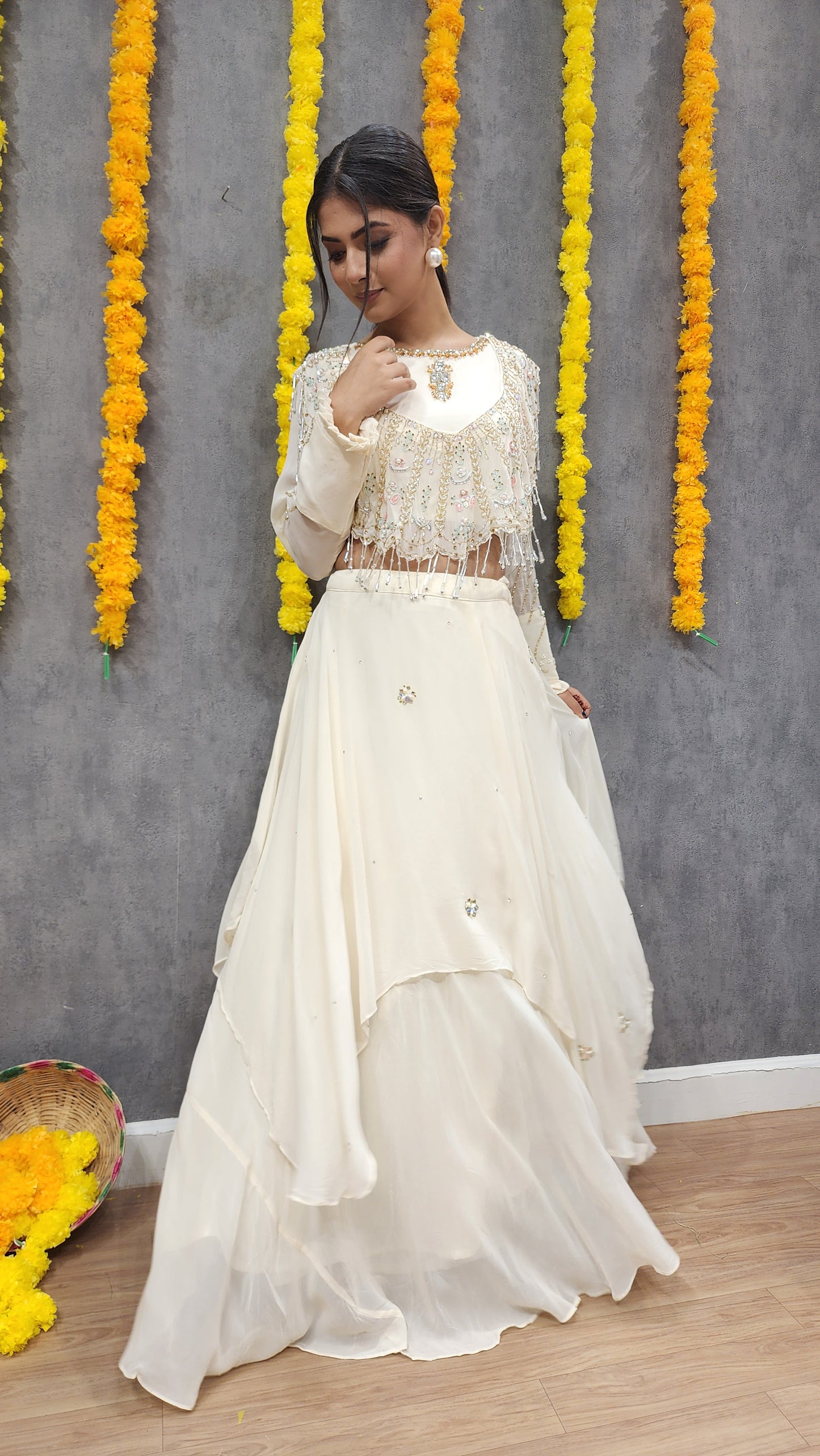 Muskan Off white detachable cape layered lehenga