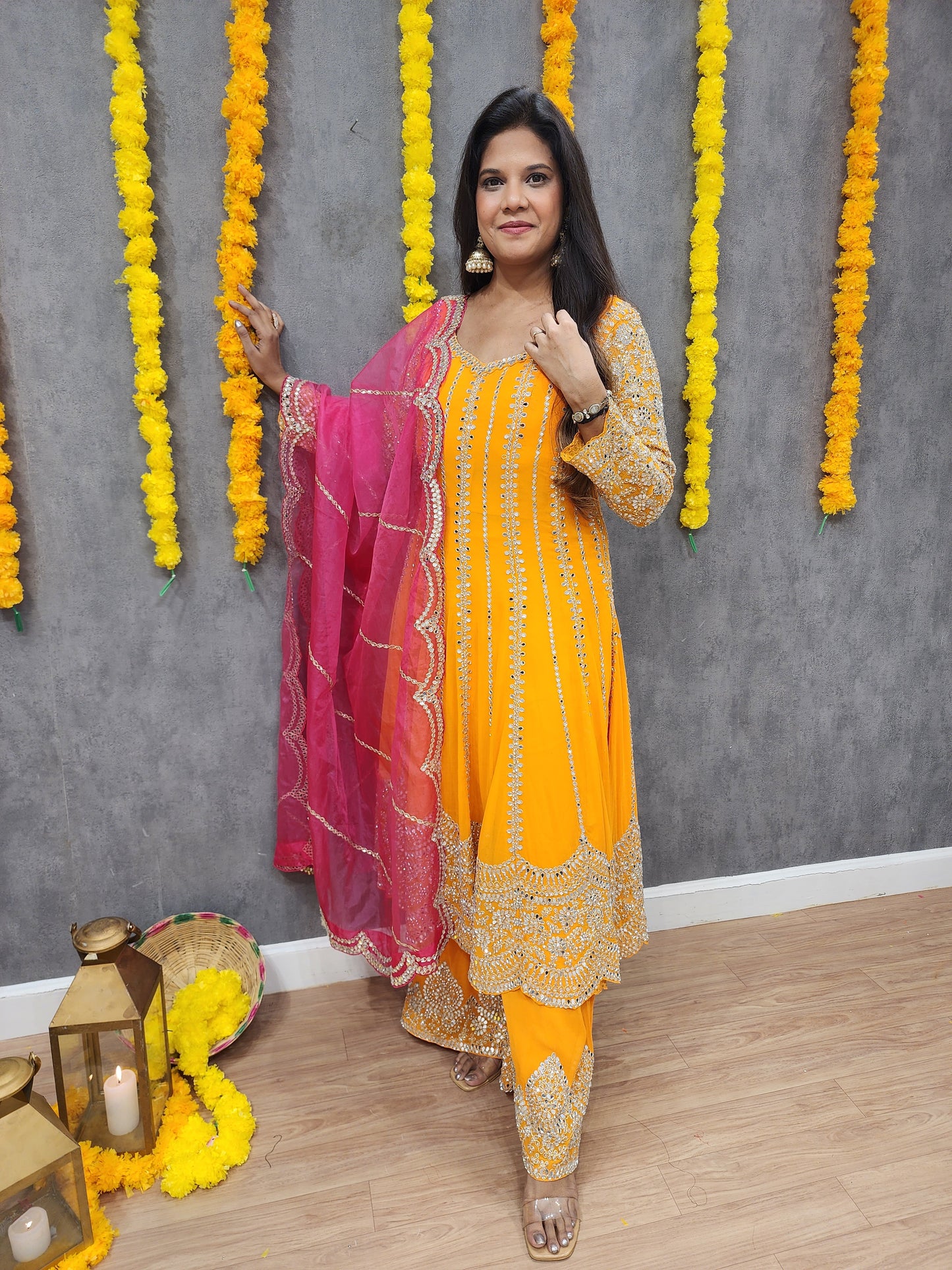 Mahira orange anarkali suit with pink dupatta