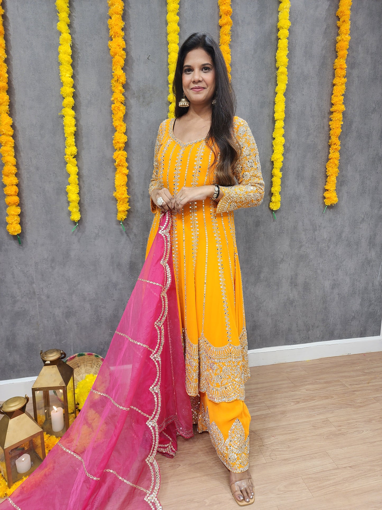Mahira orange anarkali suit with pink dupatta