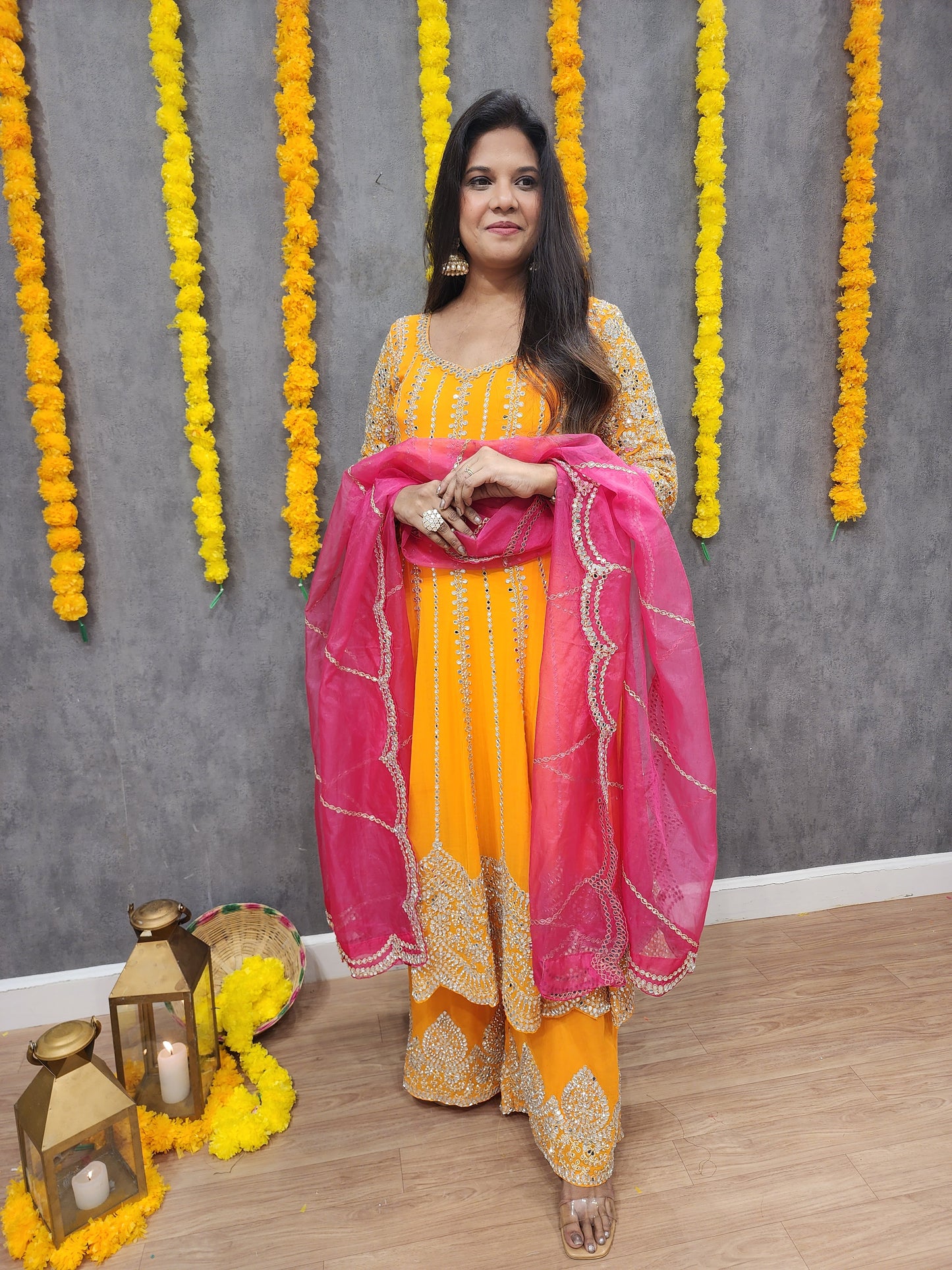Mahira orange anarkali suit with pink dupatta