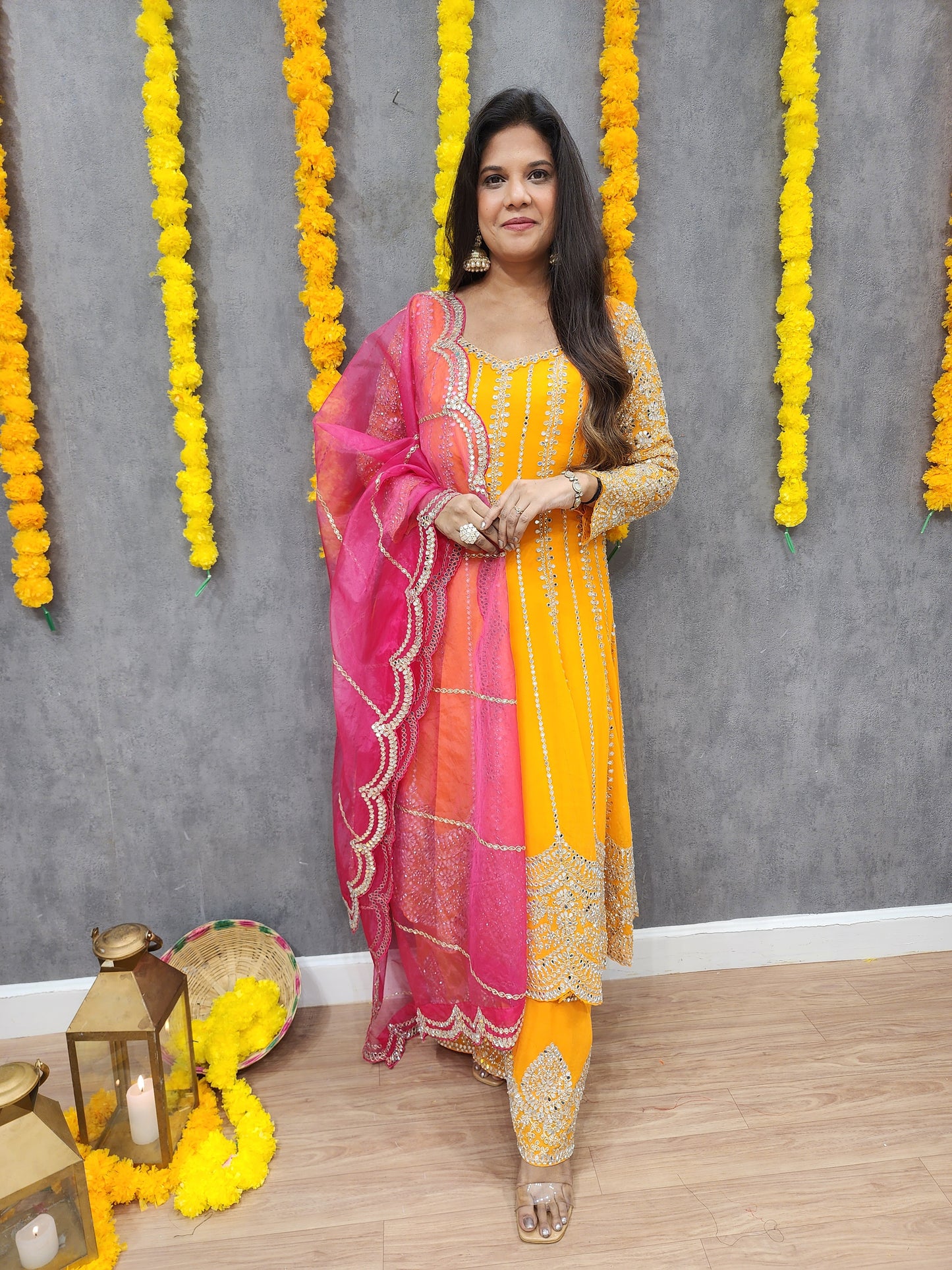 Mahira orange anarkali suit with pink dupatta