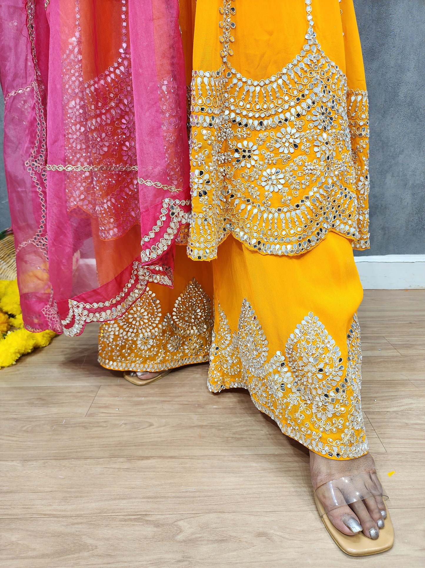 Mahira orange anarkali suit with pink dupatta