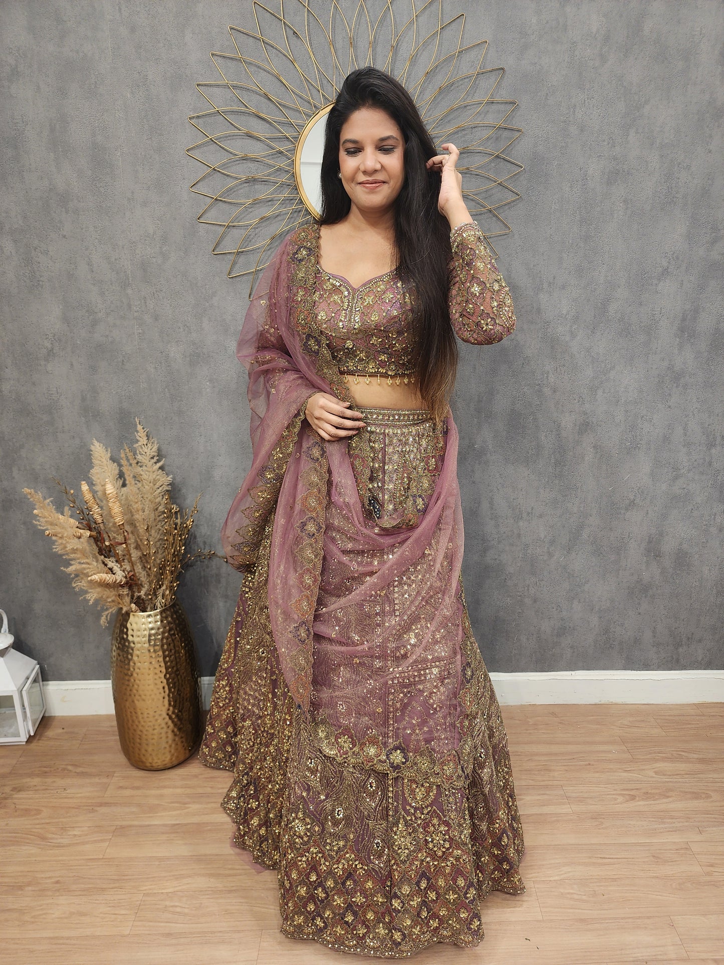 Aariwork Mauve net lehenga set