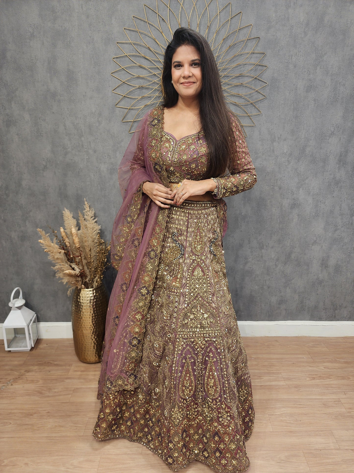 Aariwork Mauve net lehenga set