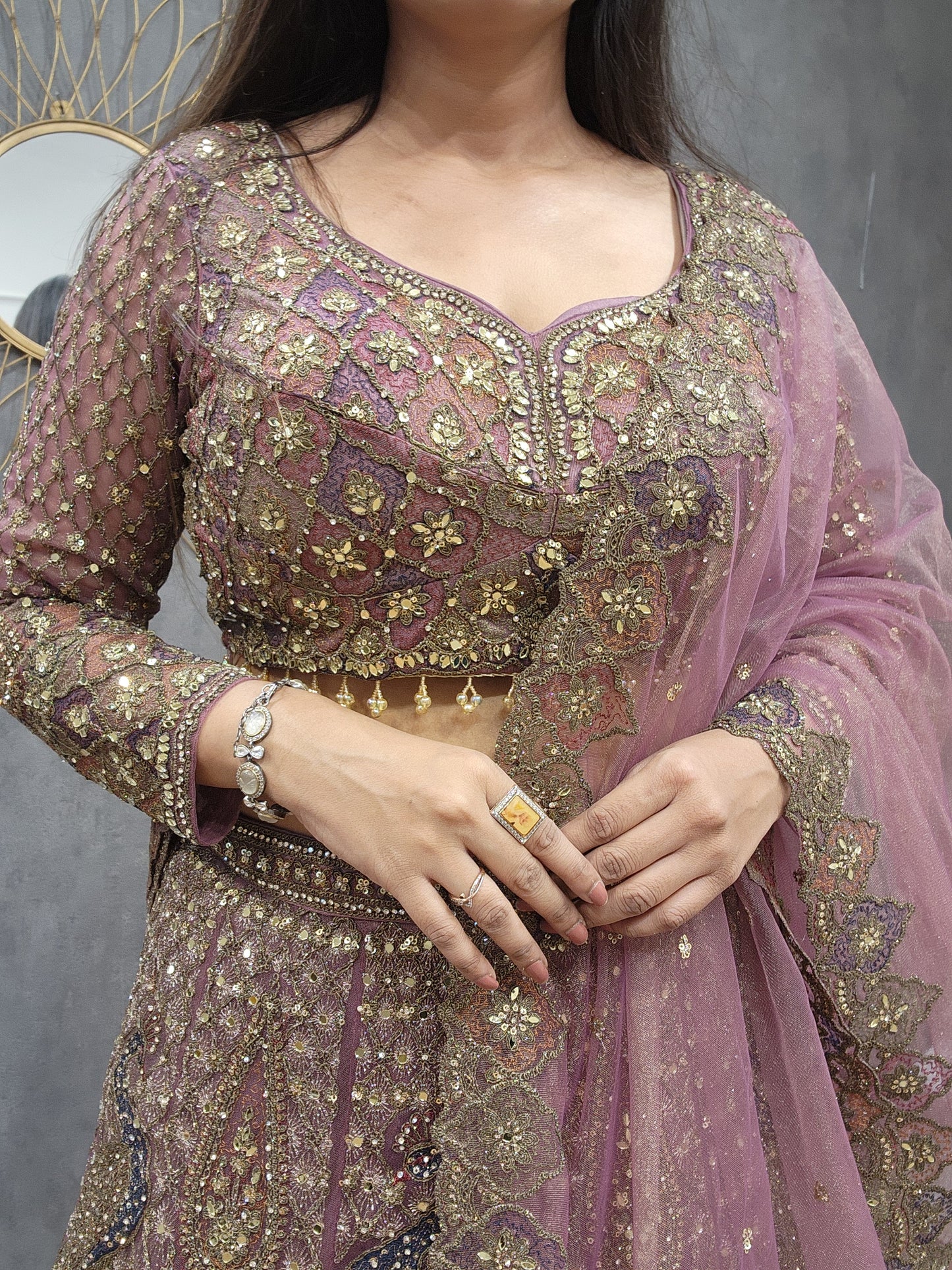 Aariwork Mauve net lehenga set