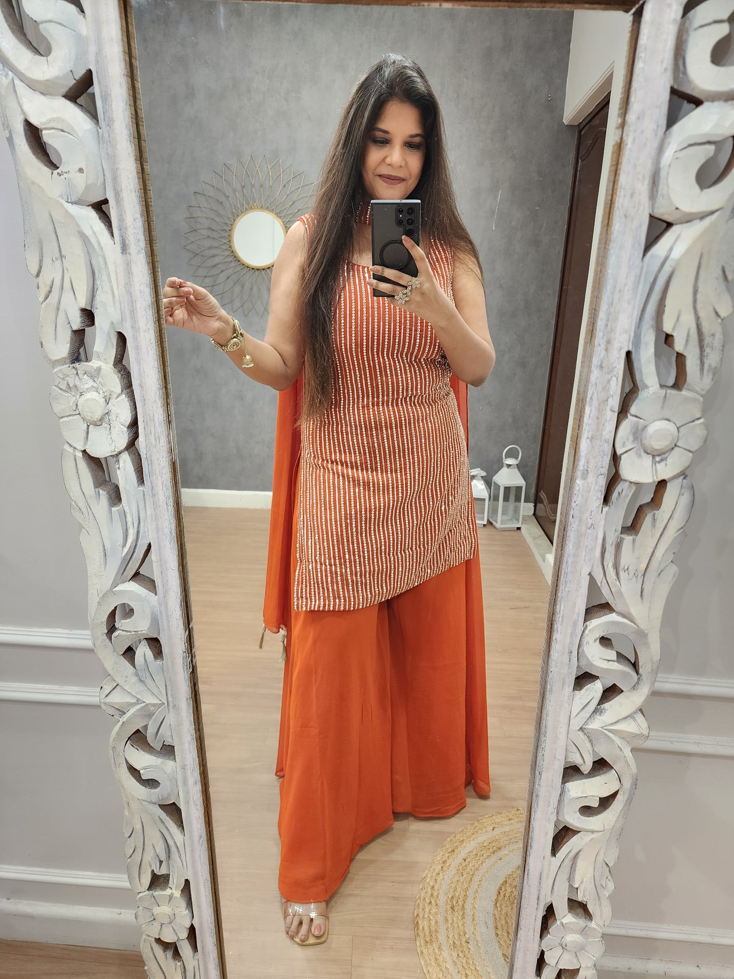 Kismat orange georgette sharara(seperate half sleeves )