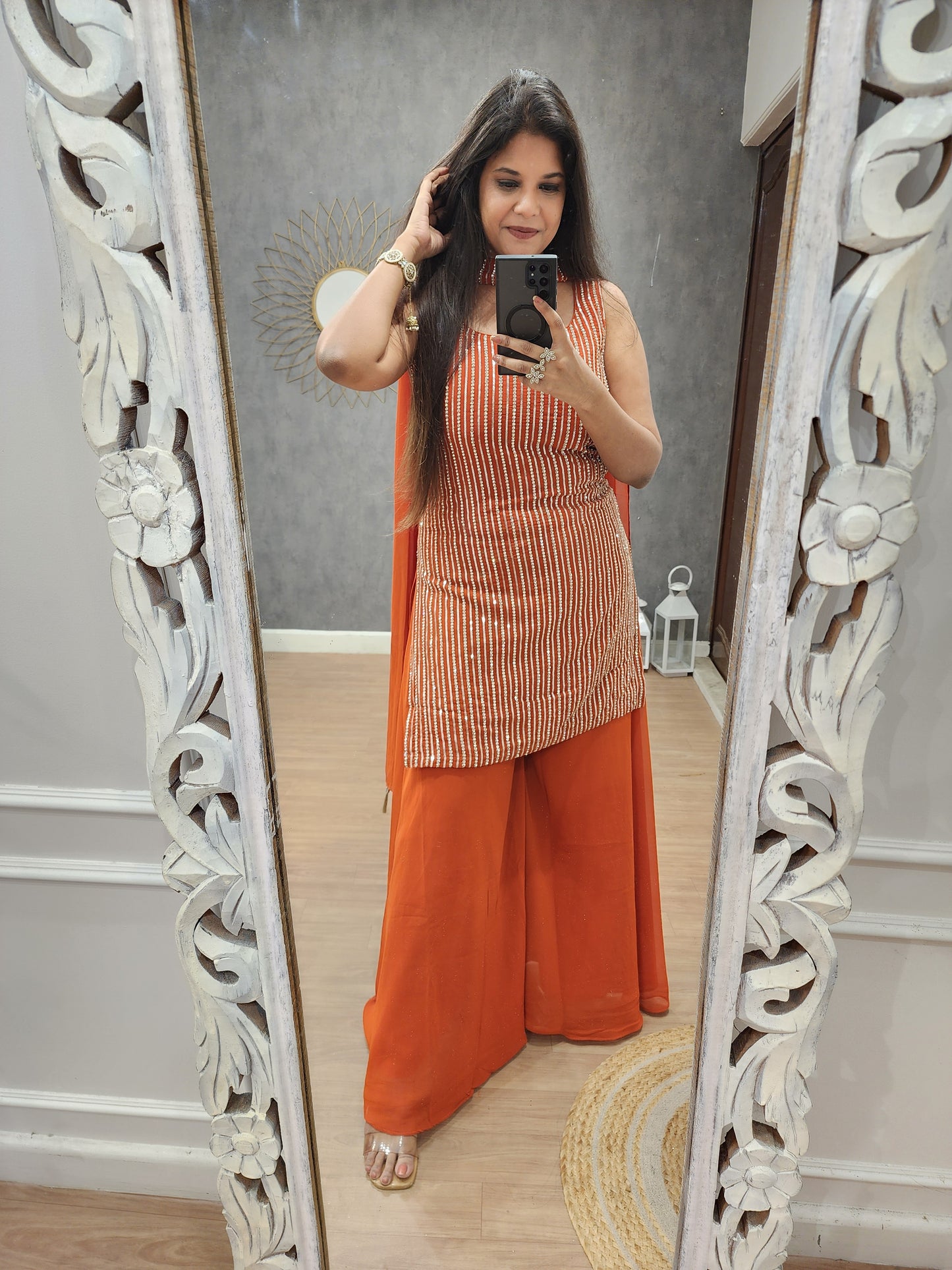 Kismat orange georgette sharara(seperate half sleeves )