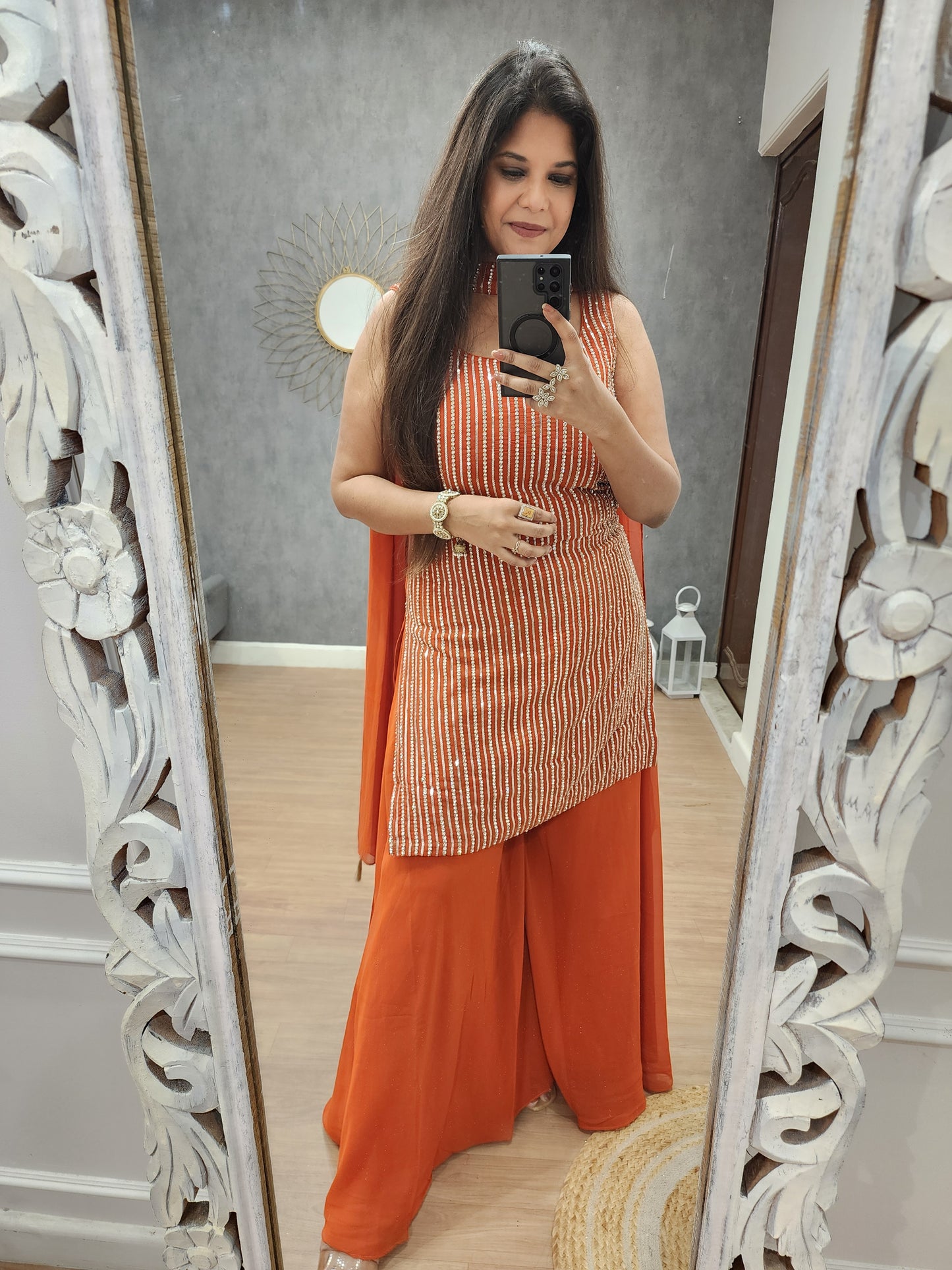 Kismat orange georgette sharara(seperate half sleeves )
