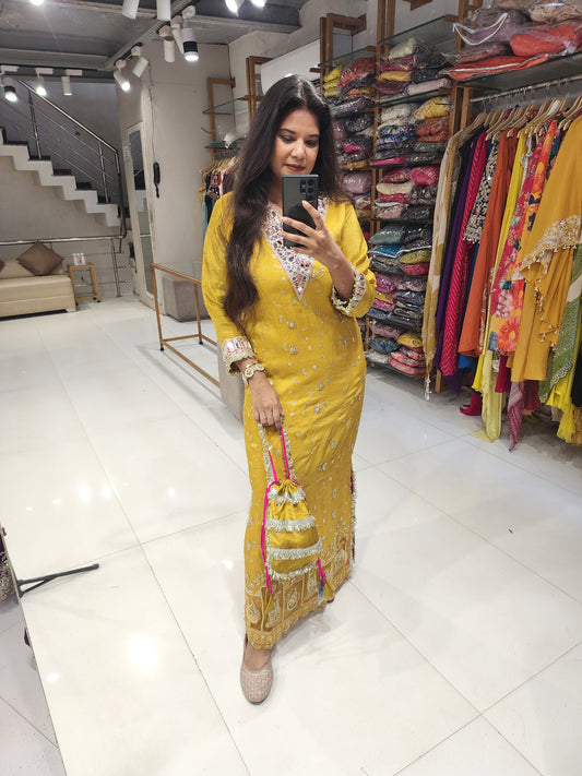 Side cut one piece dress with potli