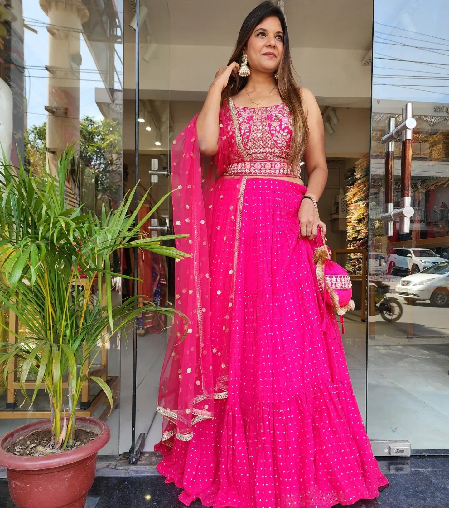 MOUNI HOT PINK EMBROIDED LEHENGA WITH POTLI