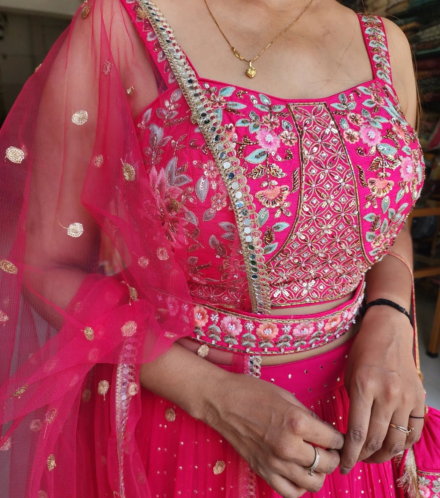 MOUNI HOT PINK EMBROIDED LEHENGA WITH POTLI