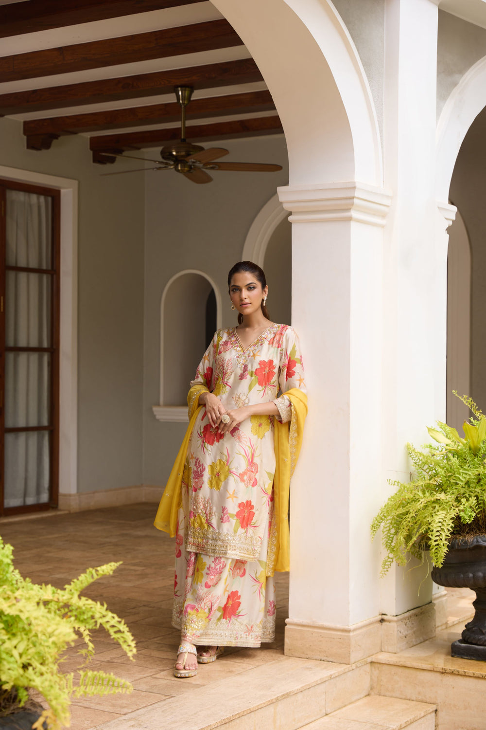 Yellow floral embellished divider sharara suit