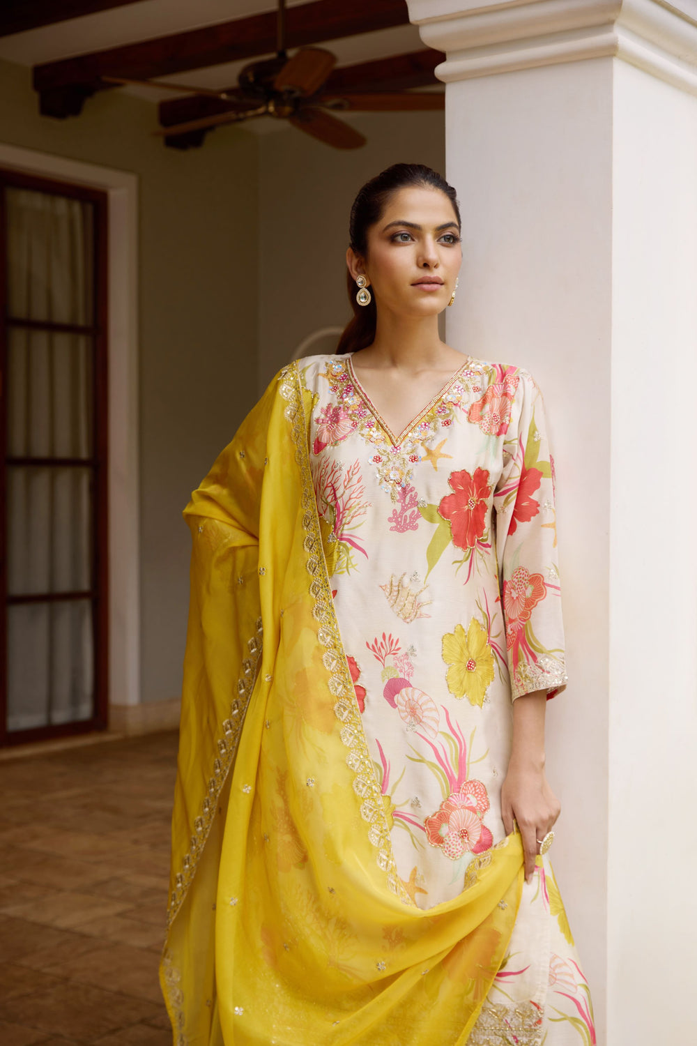 Yellow floral embellished divider sharara suit