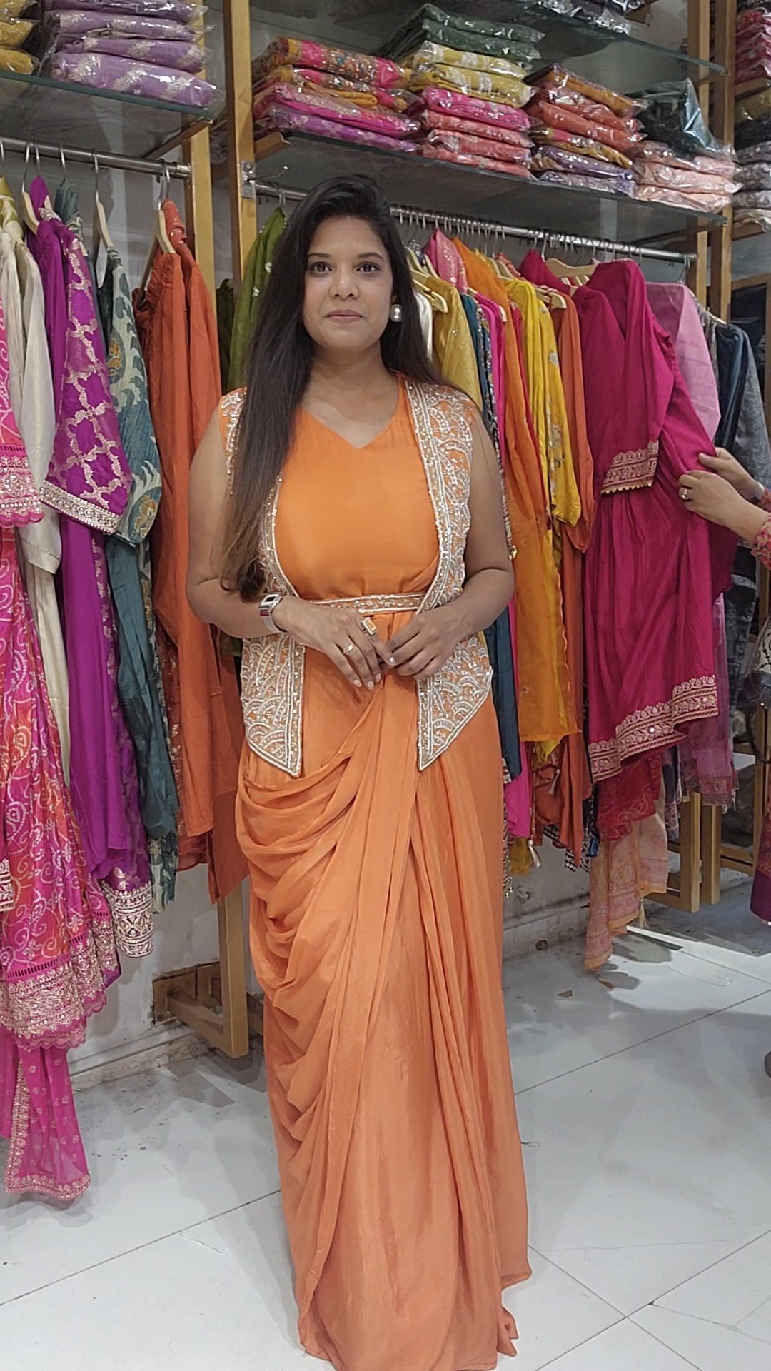 Orange one piece drape with jacket and belt