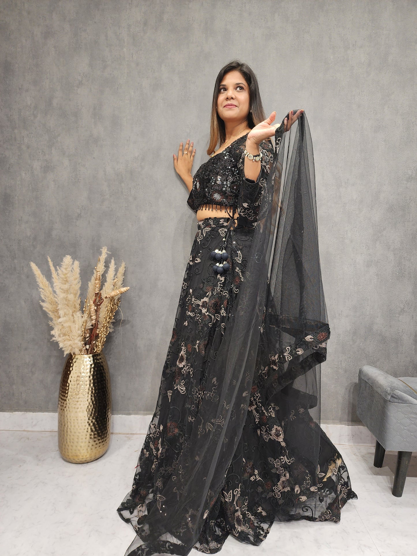 DEEPIKA BLACK SEQUENCE EMBROIDED NET LEHENGA