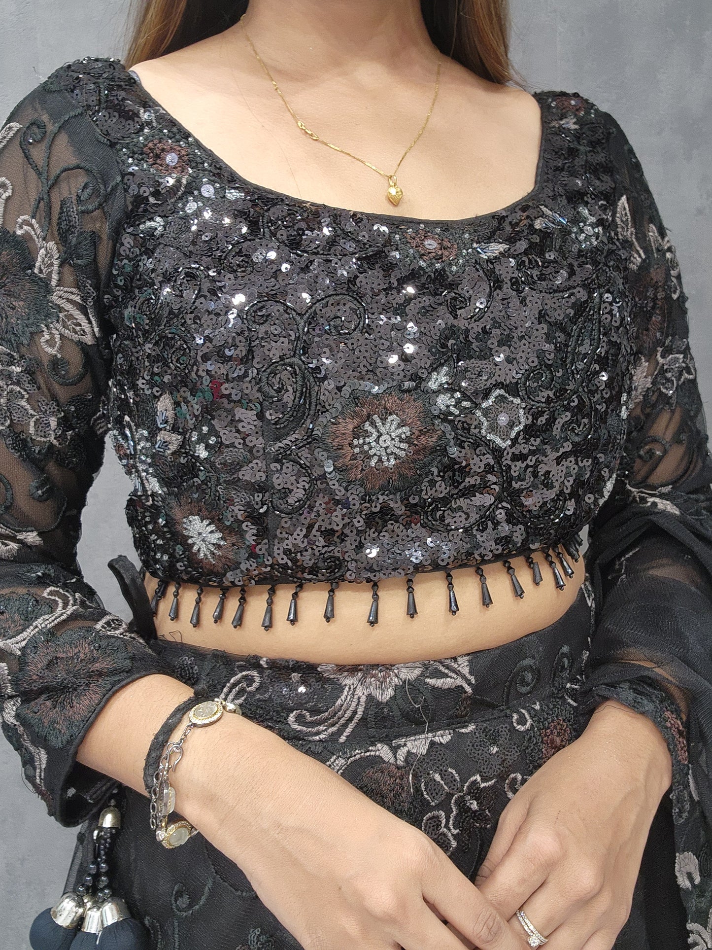 DEEPIKA BLACK SEQUENCE EMBROIDED NET LEHENGA