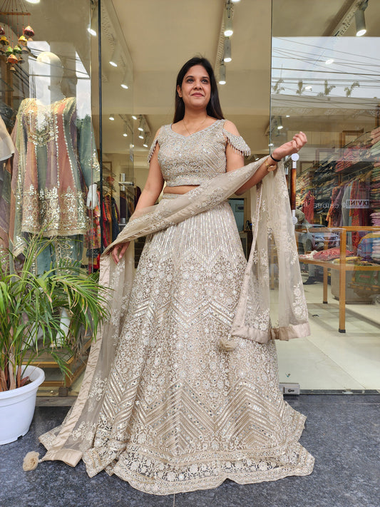 CHAMPAGNE AARIWORK LEHENGA WITH REAL MIRROR DETAILING