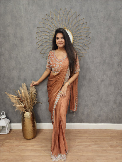 Burnt orange crepe siroski saree