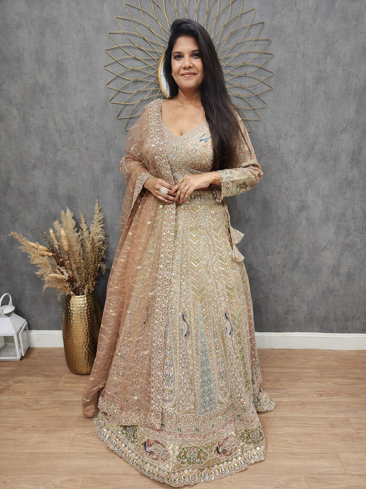 Peacock aariwork net lehenga with peach dupatta