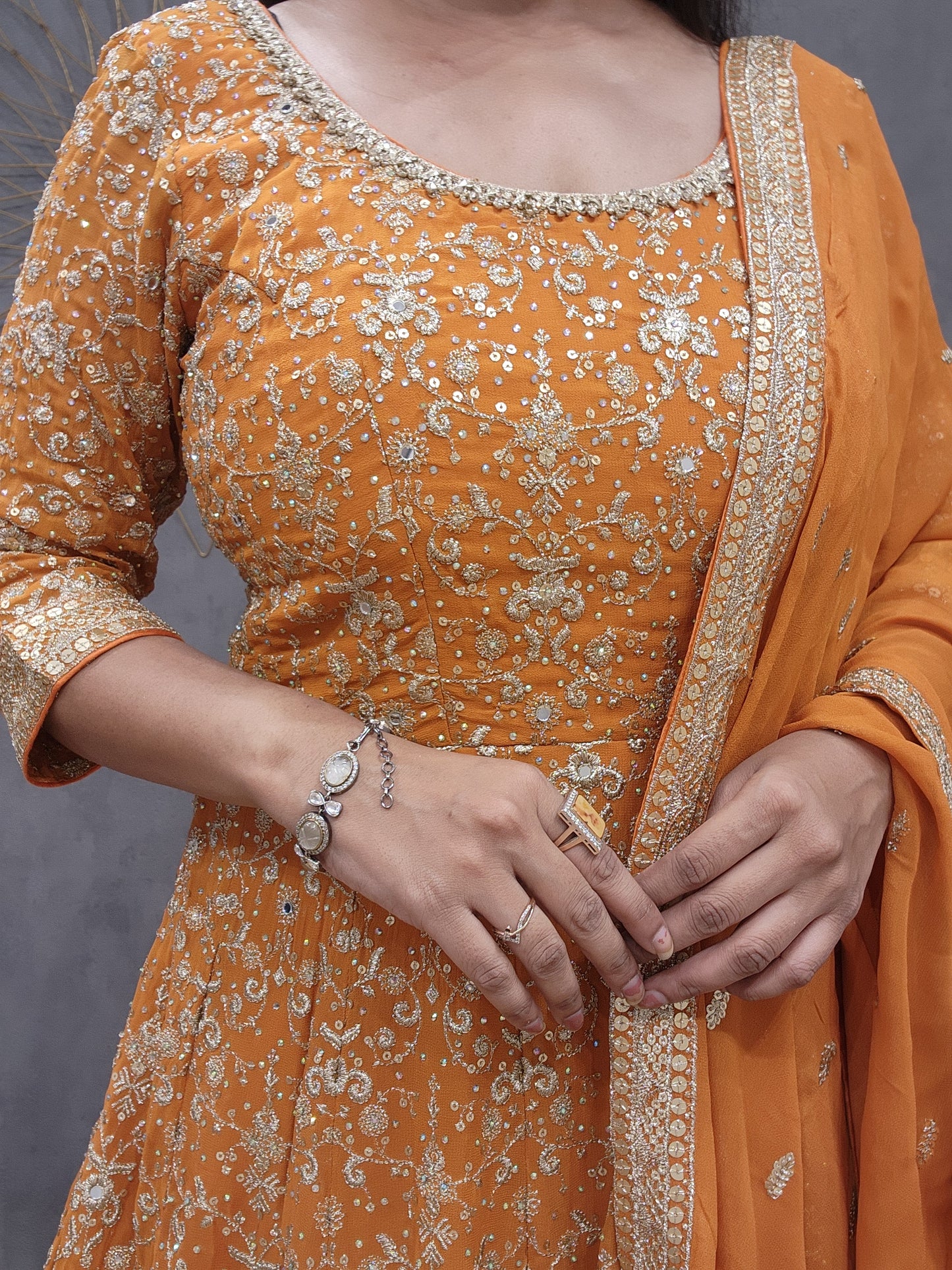 Meera orange anarkali suit