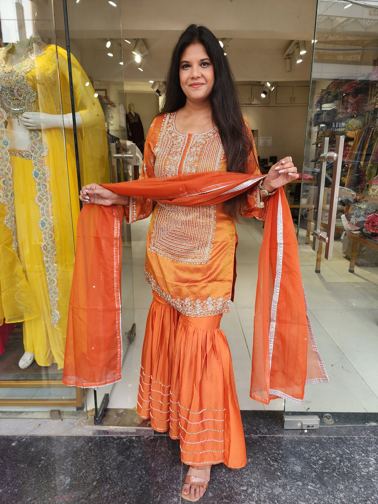 Kohinoor orange garara suit