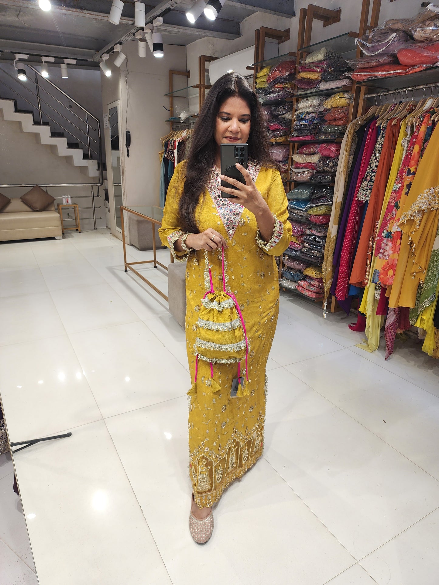 Side cut one piece dress with potli